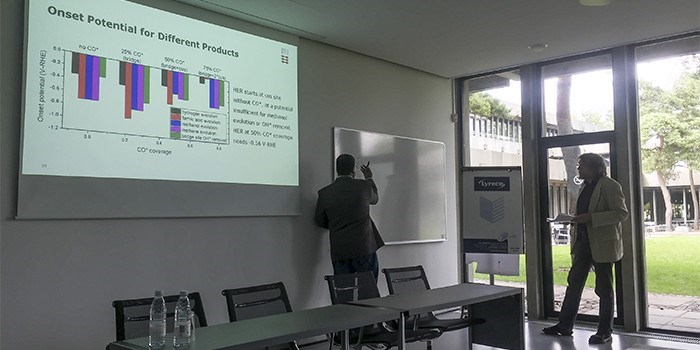 Arghya Bhowmik explains his findings to one of the opponents, Poul Norby, at the PhD defence