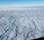 Smeltevand skærer sig ned indlandsisens overflade i det vestlige Grønland om sommeren. Når vandet når klippebunden under ismasserne kan det forårsage ændringer i hastigheden, gletsjerne glider mod havet med. Forskere fra bl.a. DTU Space og Université Grenoble Alpes har netop kortlagt, hvordan smeltevand også om vinteren trænger ned under indlandsisen. (Foto: Nathan Maier)